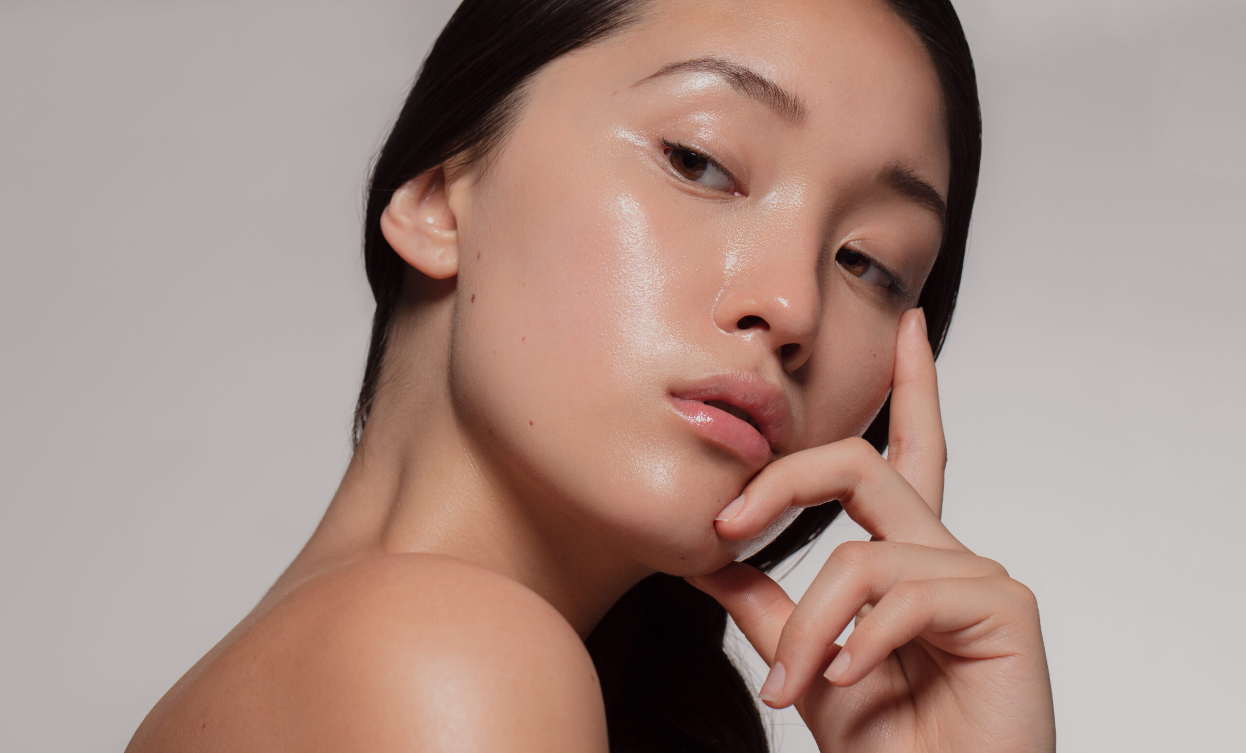 Close-up of a woman with smooth, radiant skin after aesthetic treatment